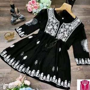 woman’s fancy top & tunics